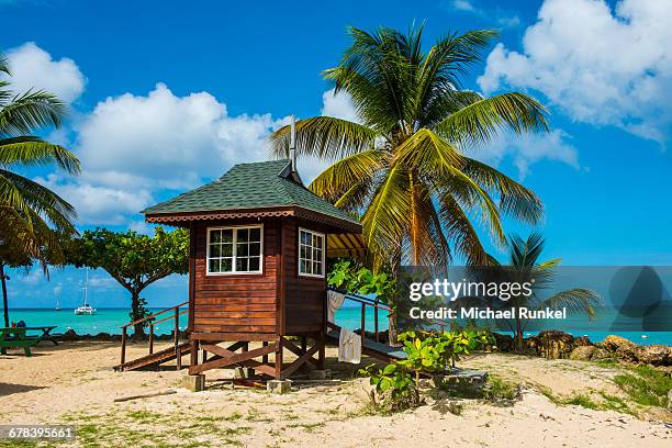 baywatch tower on pigeon point, tobago, trinidad and tobago, west indies, caribbean, central america - trinidad stock pictures, royalty-free photos & images