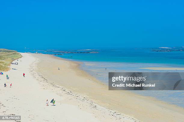 view over shell beach, herm, channel islands, united kingdom, europe  - outcrop stock pictures, royalty-free photos & images