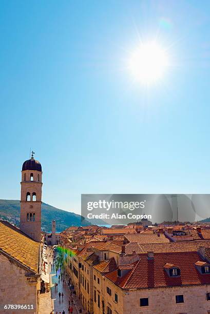 the stradun (placa ulica) and tower of the franciscan monastery, old town (stari grad), unesco world heritage site, dubrovnik, dalmatia, croatia, europe - monastery stock pictures, royalty-free photos & images