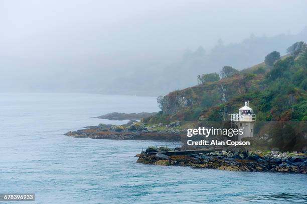 carraig mhor lighthouse, sound of islay near port askaig, argyll and bute, scotland, united kingdom, europe - alan copson stock pictures, royalty-free photos & images