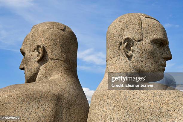 back to back, detail of a sculptural group on the monolith plateau by gustav vigeland, frogner park, oslo, norway, scandinavia, europe - gustav vigeland sculpture park stock-fotos und bilder