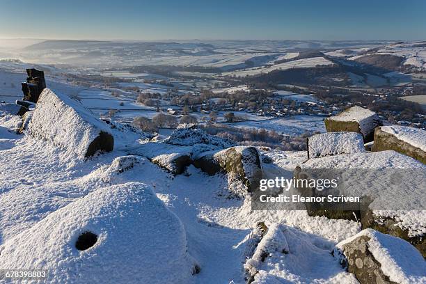 fresh snow on millstone, curbar edge, misty derwent valley with curbar and baslow villages, peak district, derbyshire, england, united kingdom, europe - baslow imagens e fotografias de stock