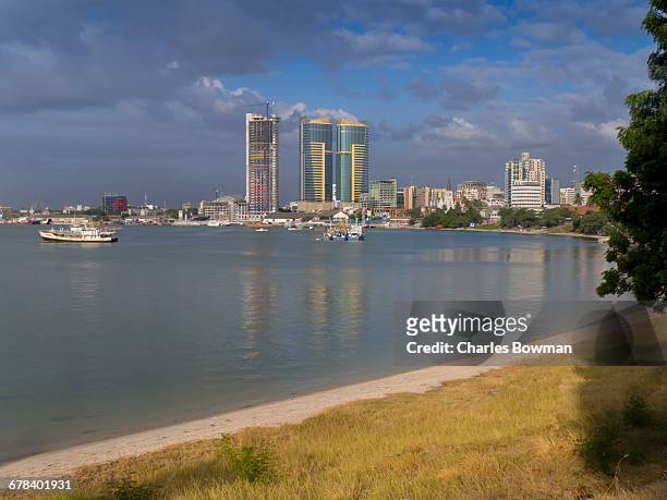 harbour with city skyline, dar es salaam, tanzania, east africa, africa - dar es salaam stock-fotos und bilder