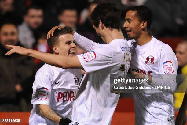 Leyton Orient's Dean Cox celebrates scoring his teams fourth goal of the game with teammate David Mooney