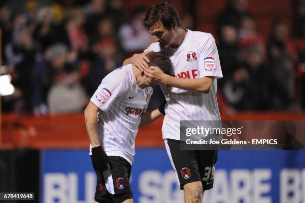 Leyton Orient's Dean Cox celebrates scoring his teams fourth goal of the game with teammate David Mooney