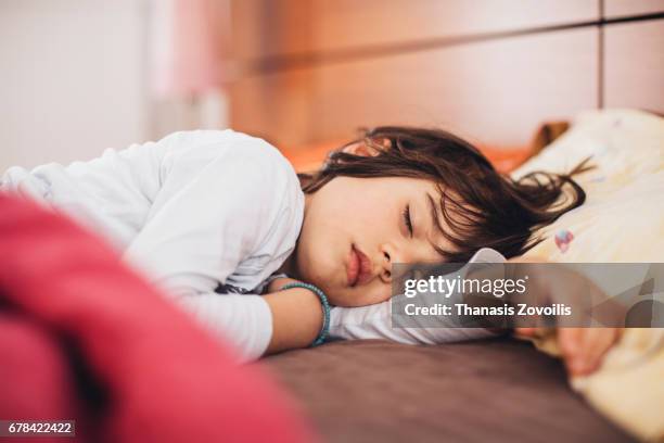 6 year old boy sleeping - beds dreaming children stock pictures, royalty-free photos & images