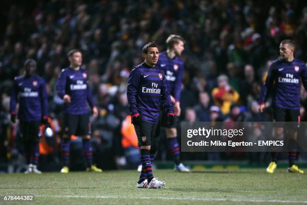Arsenal's Santi Cazorla and teammates stand dejected