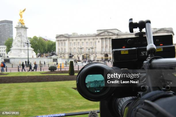 View of Buckingham Palace is seen through the finder of a TV camera as media await the return of Queen Elizabeth II and Prince Philip, Duke of...