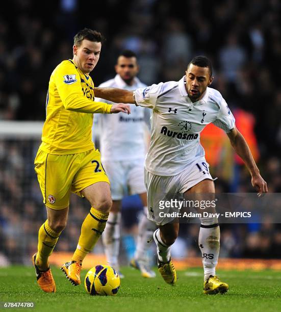 Reading's Danny Guthrie and Tottenham Hotspur's Moussa Dembele battle for the ball