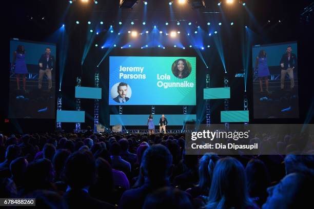 The Show host Lola Ogunnaike and PEOPLE Now host Jeremy Parsons speak onstage during Time Inc. NewFront 2017 at Hammerstein Ballroom on May 4, 2017...