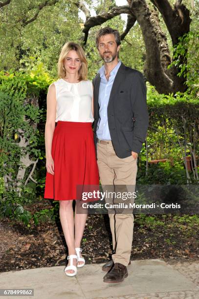 Kim Rossi Stuart and Rike Schmid attend a photocall for 'Il Commissario Maltese' in Rome on May 4, 2017 in Rome, Italy.