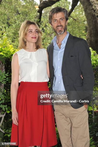 Kim Rossi Stuart and Rike Schmid attend a photocall for 'Il Commissario Maltese' in Rome on May 4, 2017 in Rome, Italy.