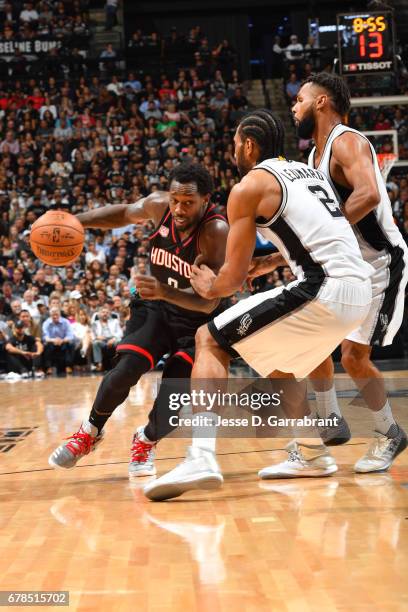 Patrick Beverley of the Houston Rockets handles the ball against the San Antonio Spurs during Game Two of the Western Conference Semifinals of the...