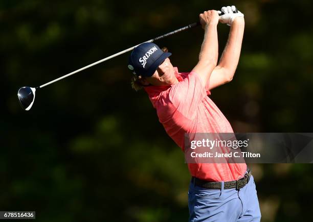 Will Wilcox plays his shot from the fourth tee during round one of the Wells Fargo Championship at Eagle Point Golf Club on May 4, 2017 in...