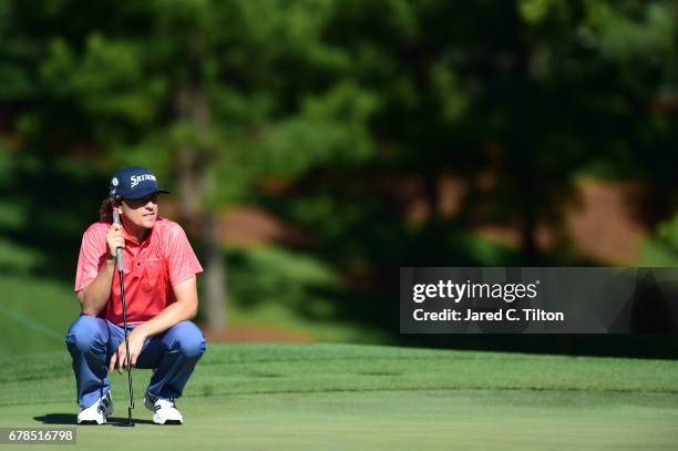 Will Wilcox lines up to putt on the fourth green during round one of the Wells Fargo Championship at Eagle Point Golf Club on May 4, 2017 in...