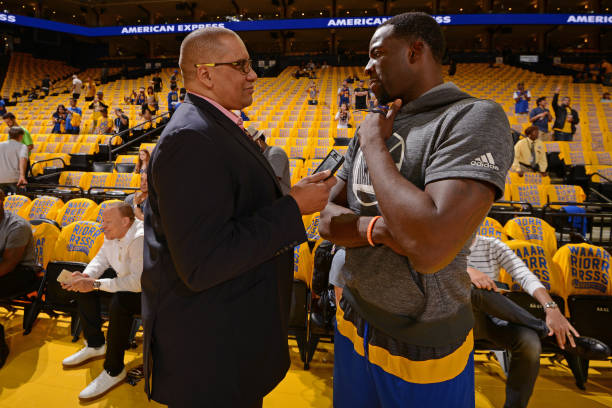 Draymond Green of the Golden State Warriors talks to Reporter, Mark Spears before Game One of the Western Conference Semifinals against the Utah Jazz...