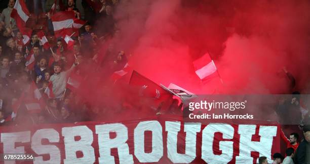 Middlesbrough fans light flares during the Premier League match between Middlesbrough FC and Sunderland AFC at Riverside Stadium on April 26, 2017 in...