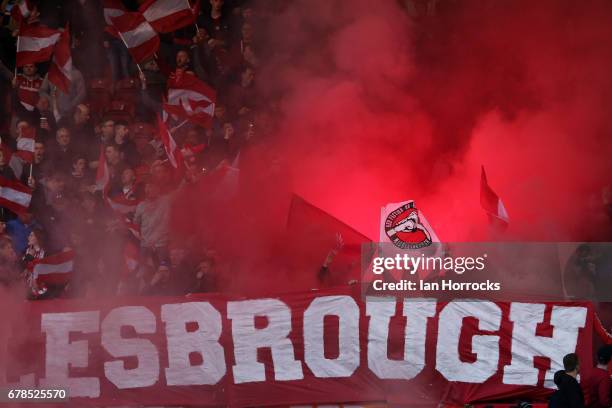 Middlesbrough fans light flares during the Premier League match between Middlesbrough FC and Sunderland AFC at Riverside Stadium on April 26, 2017 in...