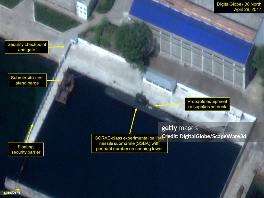 SINPO SOUTH SHIPYARD, NORTH KOREA - APRIL 29, 2017:  Figure 2. The GORAE-class ballistic missile submarine and submersible test barge remain in the secure boat basin.