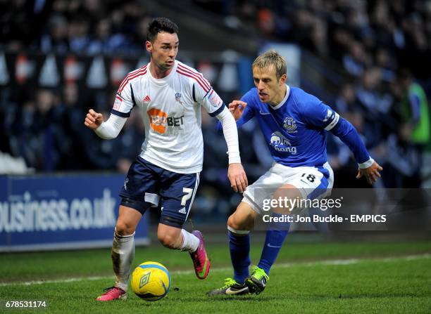 Bolton Wanderers' Chris Eagles and Everton's Phil Neville in action