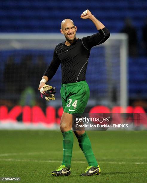 Everton goalkeeper Tim Howard celebrates after the game