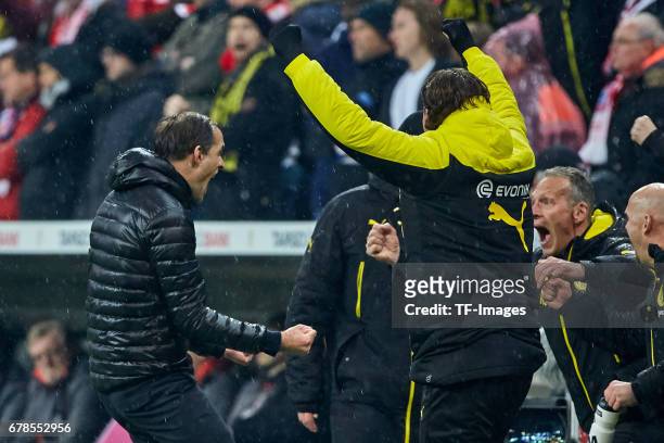 Head coach Thomas Tuchel of Dortmund , Goalkeeper Roman Weidenfeller of Dortmund and Rainer Schrey of Dortmund celebrates the win after the final...