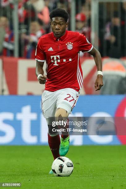 David Alaba of Bayern Munich controls the ball during the German Cup semi final soccer match between FC Bayern Munich and Borussia Dortmund at the...