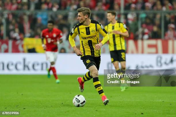 Lukasz Piszczek of Dortmund controls the ball during the German Cup semi final soccer match between FC Bayern Munich and Borussia Dortmund at the...