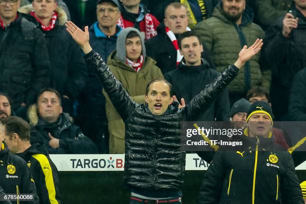 Head coach Thomas Tuchel of Dortmund gestures during the German Cup semi final soccer match between FC Bayern Munich and Borussia Dortmund at the...
