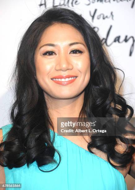 Actress Liza Lapira arrives for the Premiere Of Penny Black Promotions' "A Little Something For Your Birthday" held at Pacific Design Center on May...