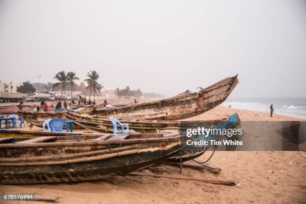 fishing boats on beach, lome , togo, africa - lomé togo stock pictures, royalty-free photos & images