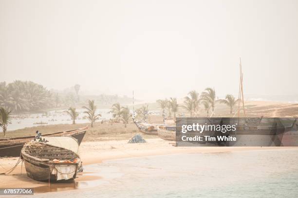 fishing boats togo - togo stock-fotos und bilder