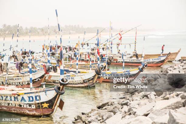 fishing boats togo - lome stock pictures, royalty-free photos & images