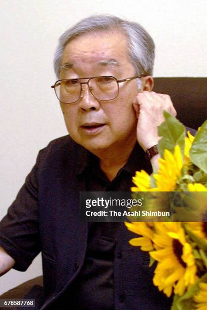 Film director Shohei Imamura speaks during the Asahi Shimbun interview after awarded the Palme d'Or at Cannes Film Festival at Shochiku headquarters...