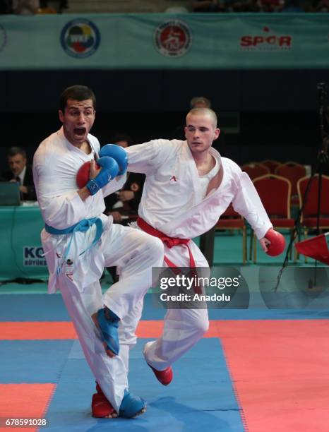 Burak Uygur of Turkey competes against Mario Hodzic of Montenegro during kumite 67 kg match within the 52nd European Karate Championships 2017 at...