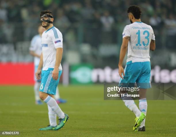 Sead Kolasinac of Schalke and Eric Maxim Choupo-Moting looks dejected during the UEFA Europa League Round of 16 second leg match between Borussia...