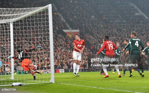 Real Madrid goalkeeper Diego Lopez makes a save from Manchester United's Danny Welbeck