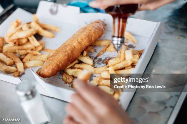 seaside couples - fish and chips stock pictures, royalty-free photos & images