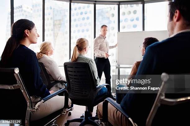 group of people in a training session - curso fotografías e imágenes de stock