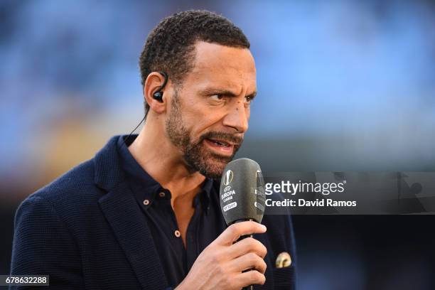 Ex-Man Utd player and pundit Rio Ferdinand looks on prior to the UEFA Europa League semi final, first leg match between Celta Vigo and Manchester...