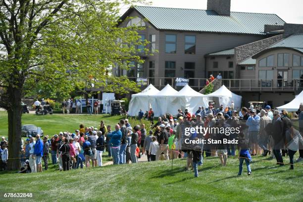 Fans watch play along the 18th hole during the final round of the Web.com Tour United Leasing & Finance Championship at Victoria National Golf Club...