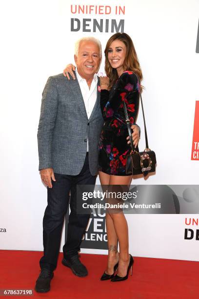 Guess designer Paul Marciano and Belen Rodriguez attend the Guess Foundation Denim Day 2017 at Palazzo Barberini on May 4, 2017 in Rome, Italy.