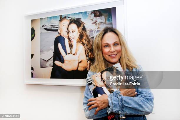 German actress Sonja Kirchberger inf ront of the picture with her of Oliver Rath during the 'Foto.Kunst.Boulevard' exhhibition opening at...