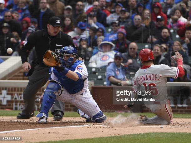 Cesar Hernandez of the Philadelphia Phillies is sade at home as Miguel Montero of the Chicago Cubs makes a late tag during the third inning on May 4,...