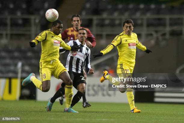 Newcastle United's Sylvain Marveaux and Anzhi Makhachkala's Jucilei da Silva battle for the ball