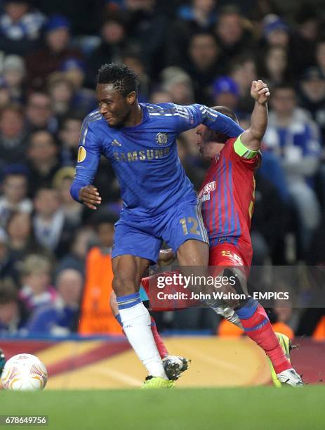 Chelsea's Mikel and Steaua Bucuresti's Alexandru Bourceanu battle for the ball