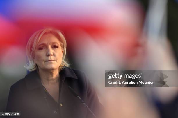 Far right Presidential candidate Marine Le Pen addresses voters during a political meeting on May 4, 2017 in Ennemain, France. Marine Le Pen faces...