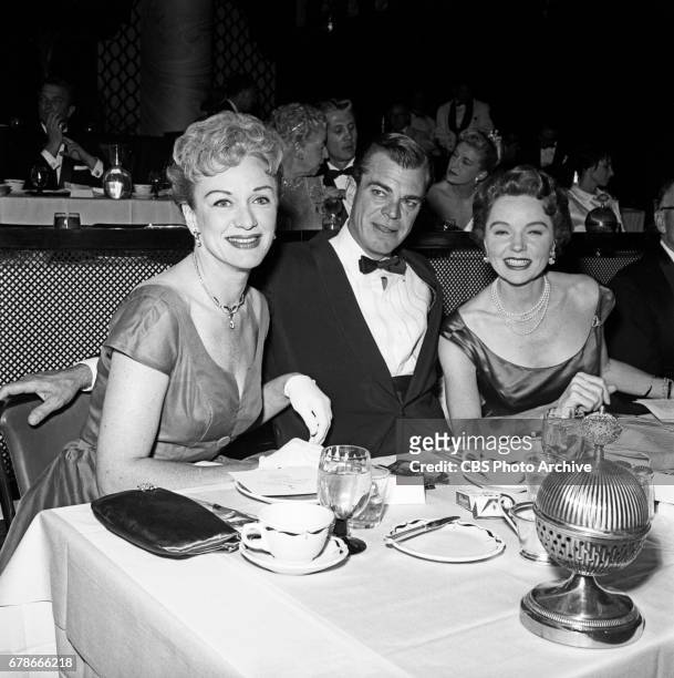 Eve Arden, Brooks West and Jane Wyatt pose for a photo at the The 10th Annual EMMY Awards, presented April 15, 1958 at the Coconut Grove in...