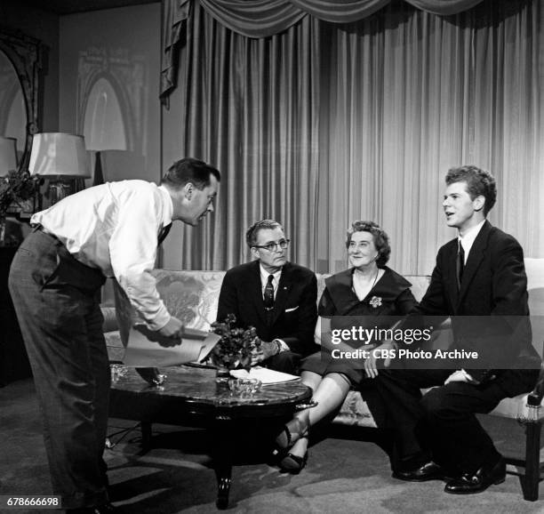 Pianist Van Cliburn is photographed with his parents Rildia Bee and Harvey Lavan Cliburn Sr., for the CBS interview program "Person to Person" in his...