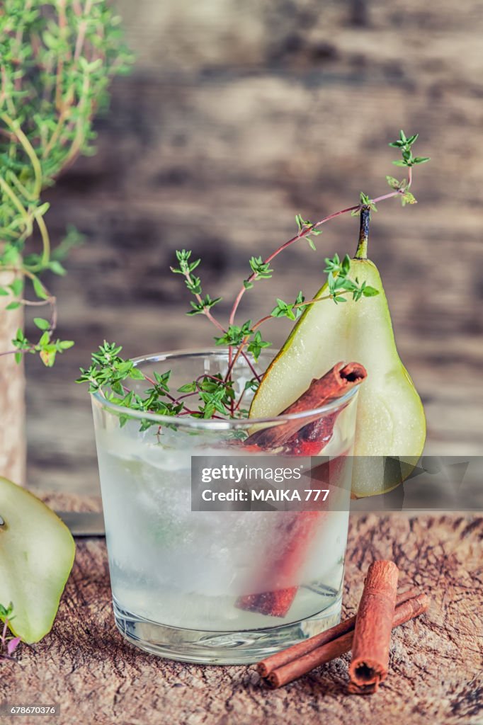 Cold lemon tea with pear and thyme